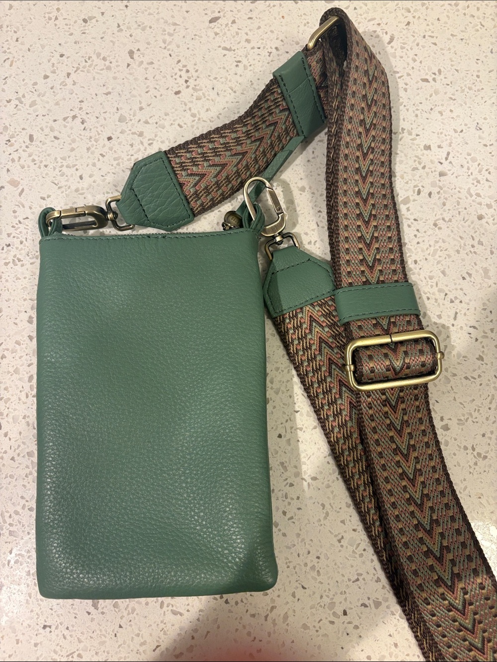 Green Leather Crossbody Purse with Decorative Strap and Cellphone Pocket